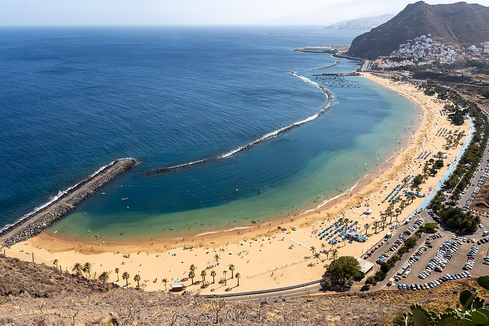The full curve of Las Teresitas in July, seen from the viewpoint above